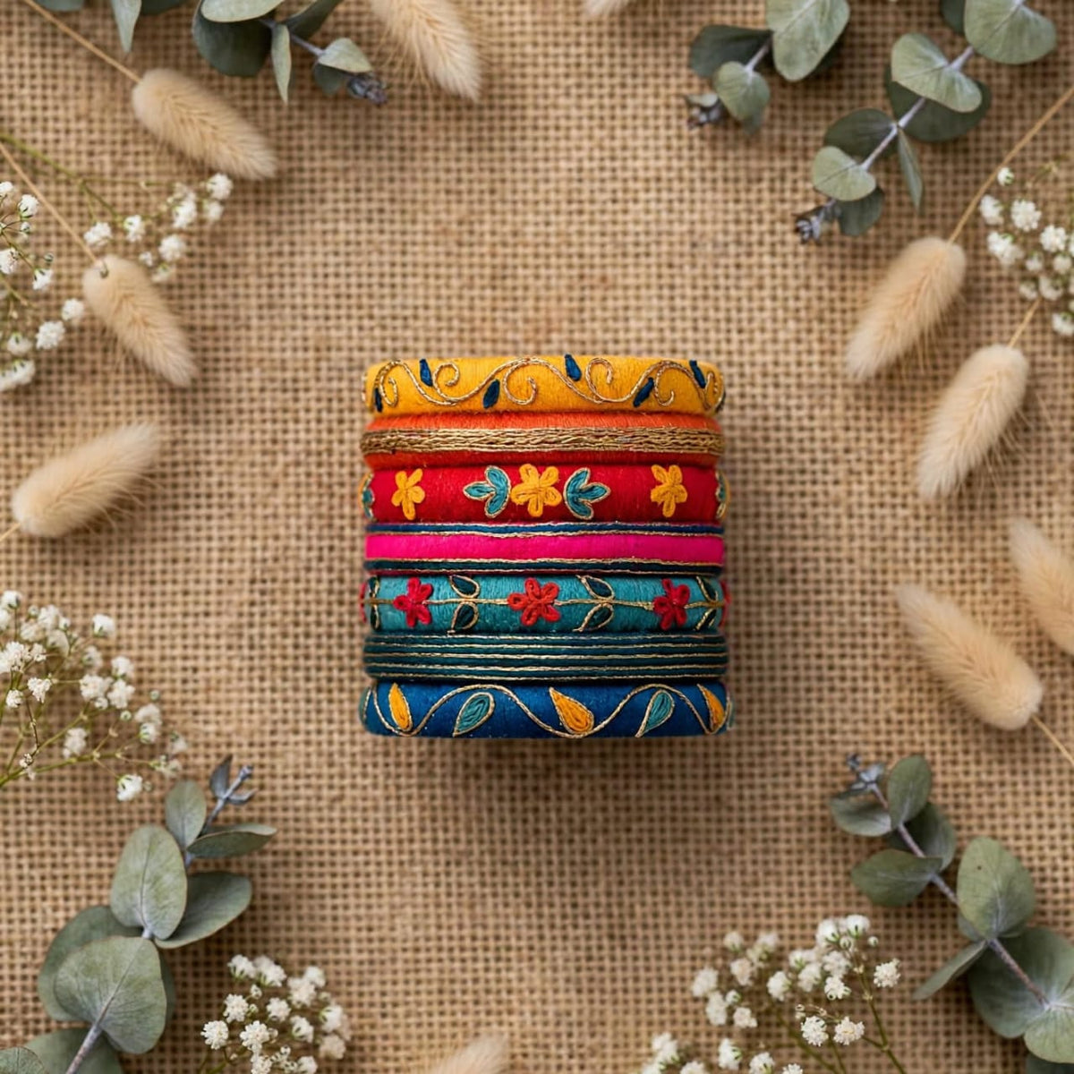 Raniya Multicolour Silk Thread Bangles Stack with Zari Borders and Motifs