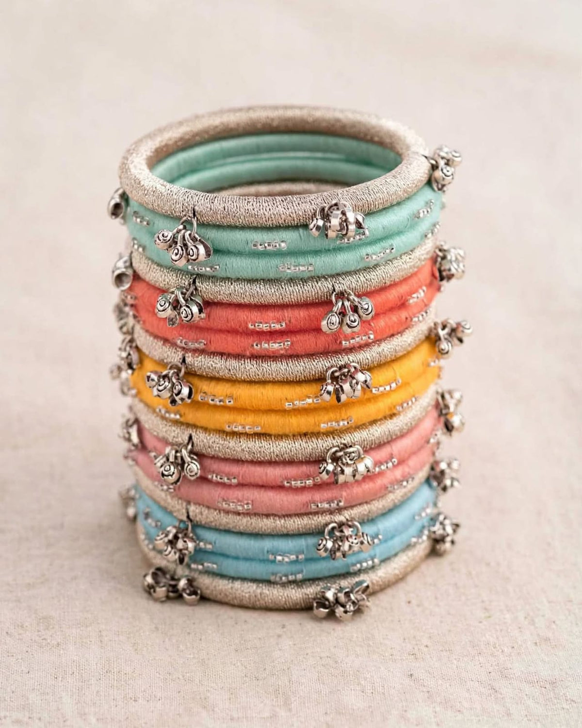 Anum Multicolour Silk Thread Bangles Stack with Silver Ghungroo Charms