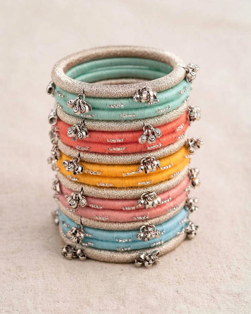 Anum Multicolour Silk Thread Bangles Stack with Silver Ghungroo Charms