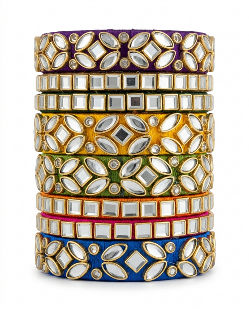 Ghazal stack of multicolor silk thread bangles with traditional kundan work by Dori Dot Collection.